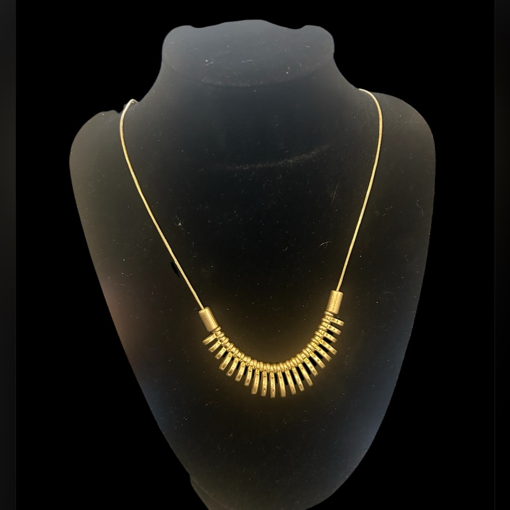Unmarked gold adjustable length necklace with circular discs